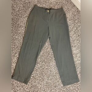 Caroline Biss: Green pants with a gold stripe on the side. comfortable.